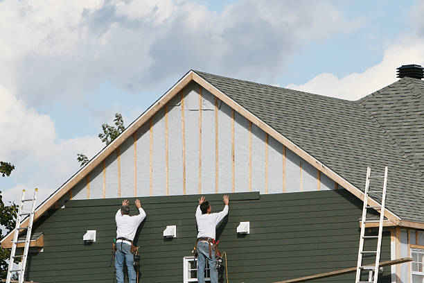 Professional Siding Contractor technician working in Dupont, PA